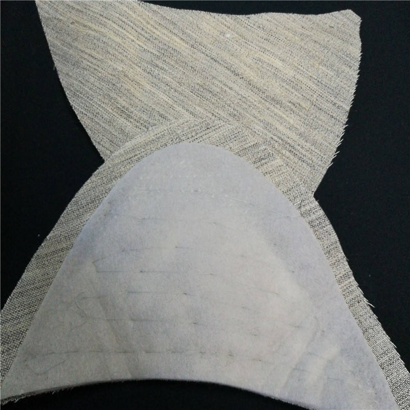 Shoulder pads used in garment shaping to enhance shoulder contour, balance, and structure.